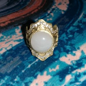 White Glass Stone with Silver and Gold Details